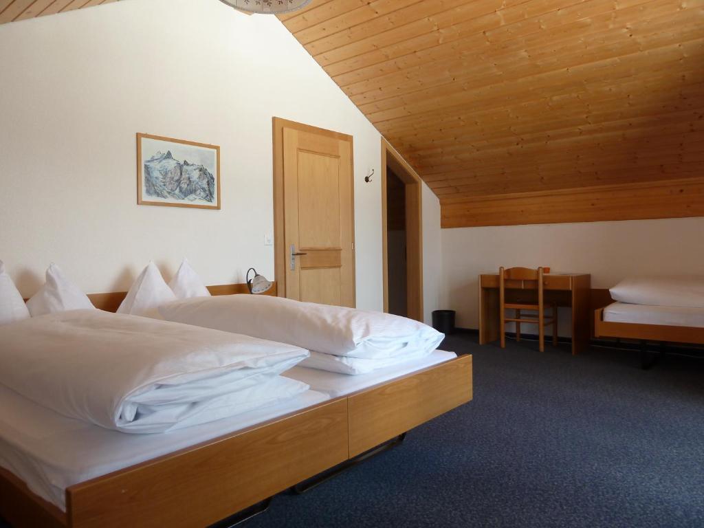 Berghaus Maennlichen Hotel กรินเดลวัลด์ ห้อง รูปภาพ